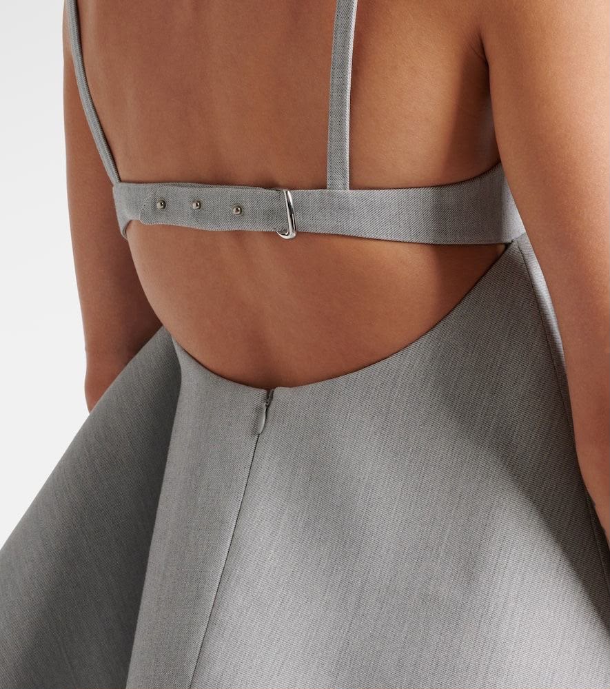 Vela Peplum Top